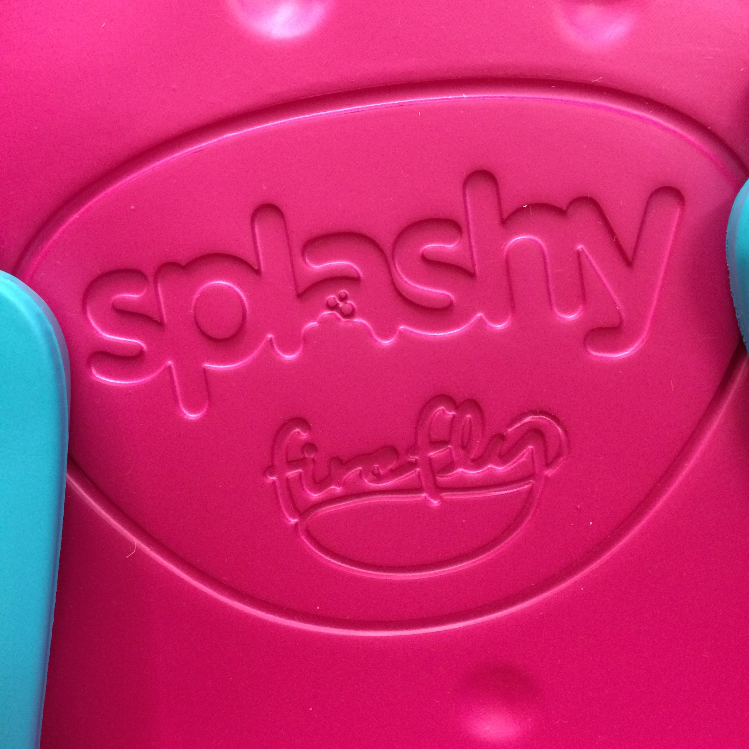 Close up of splashy firefly logo imprinted in the seat back
