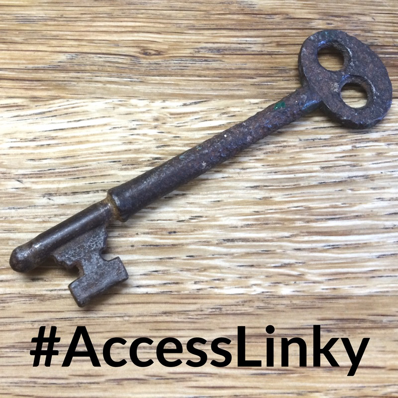 a rusty key with #accesslinky written below